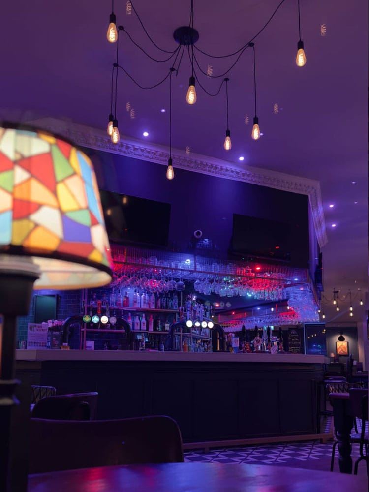 The bar counter lit up in the evening